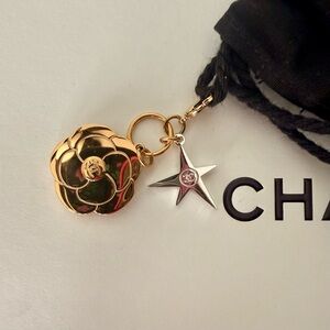 Chanel authentic Gold Floral and Silver Star Keychain and gift box